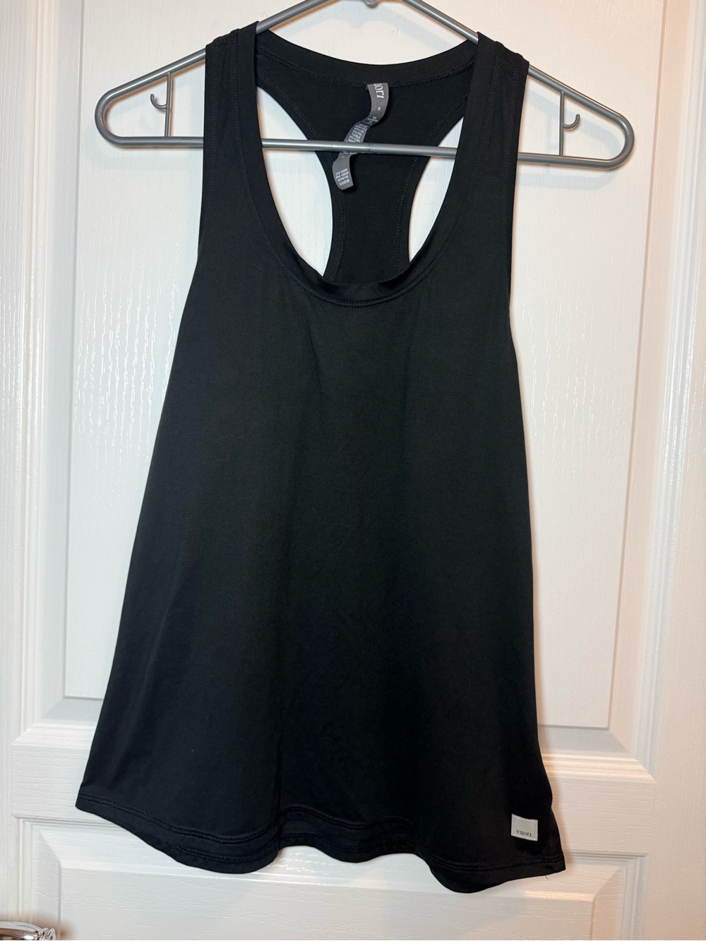Vuori black racerback loose fitting tank top. Medium